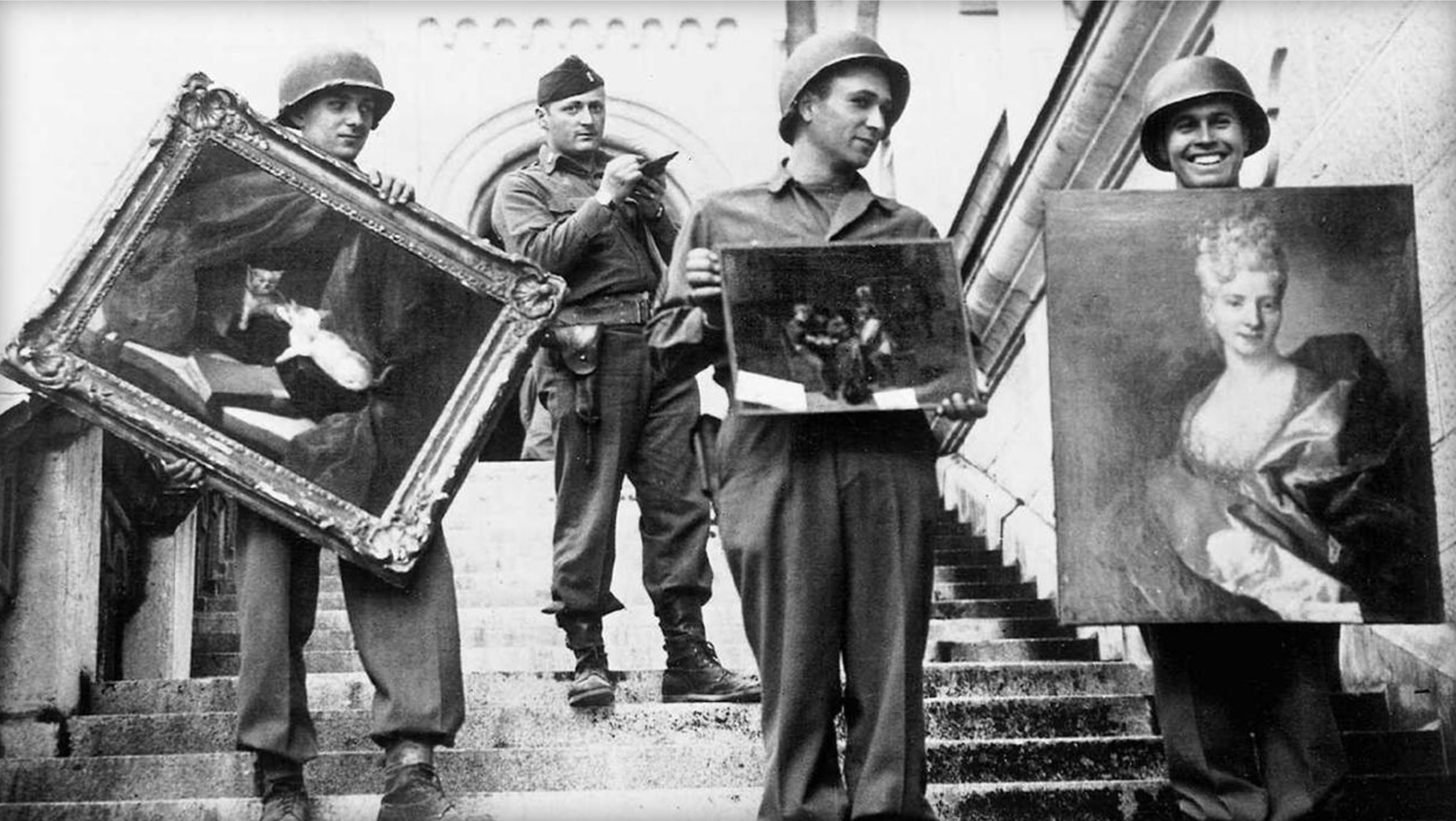 Photograph of the Monuments Men recovering stolen art from Neuschwanstein Castle, Germany, near the end of World War II