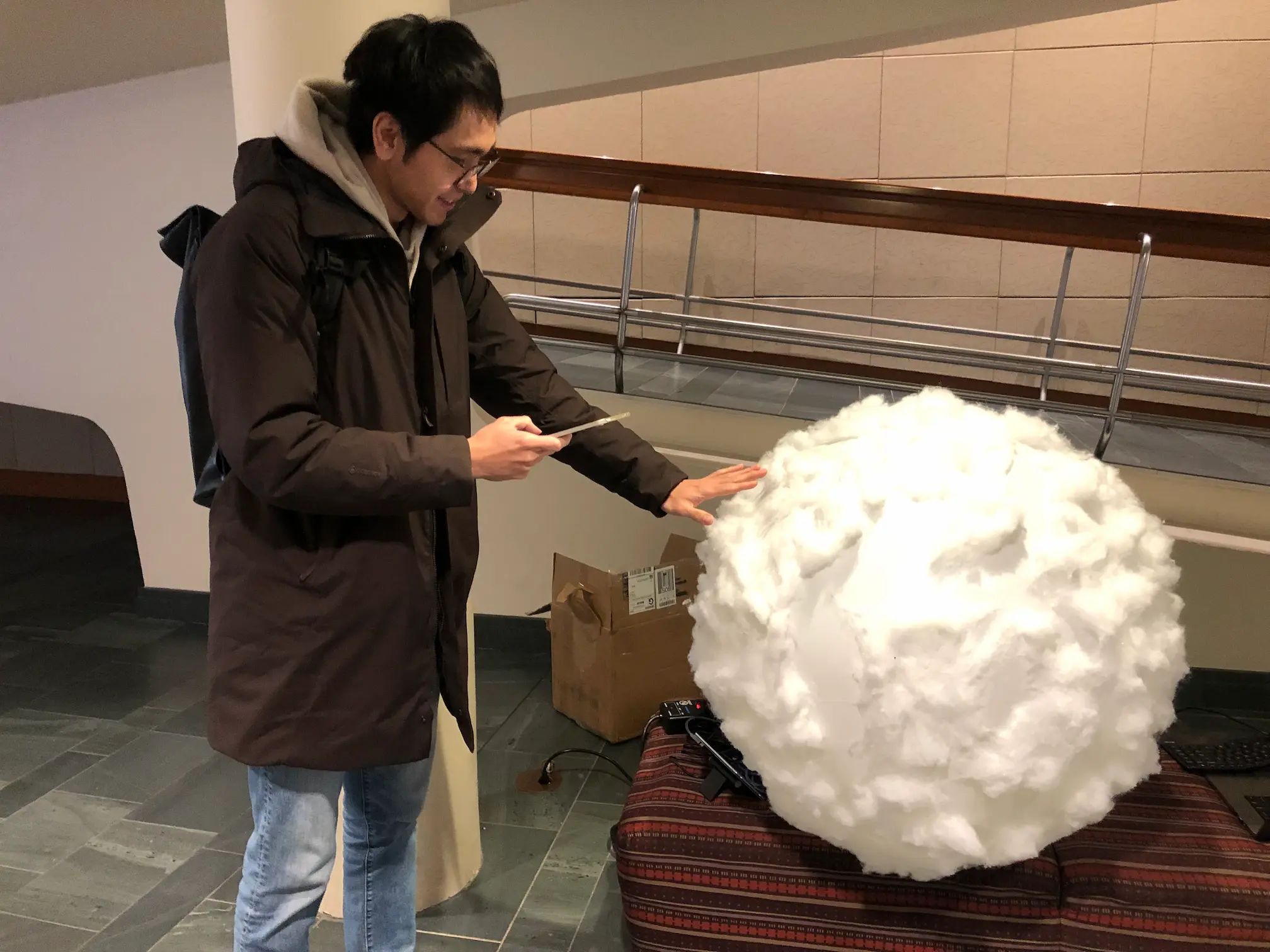 A student interacts with the Cloud app.